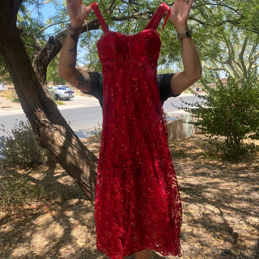 Red sparkly floral prom dress.